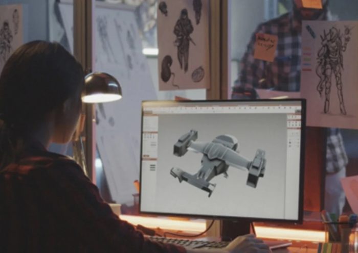 video game developer working on computer, designing animation