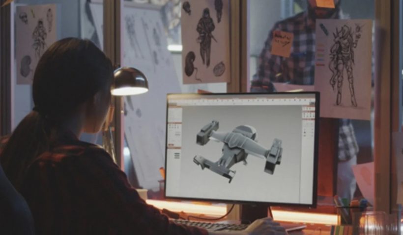 video game developer working on computer, designing animation